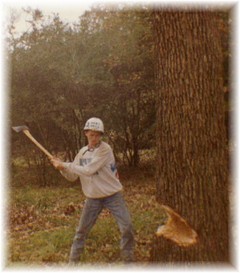 chopping a tree with an ax